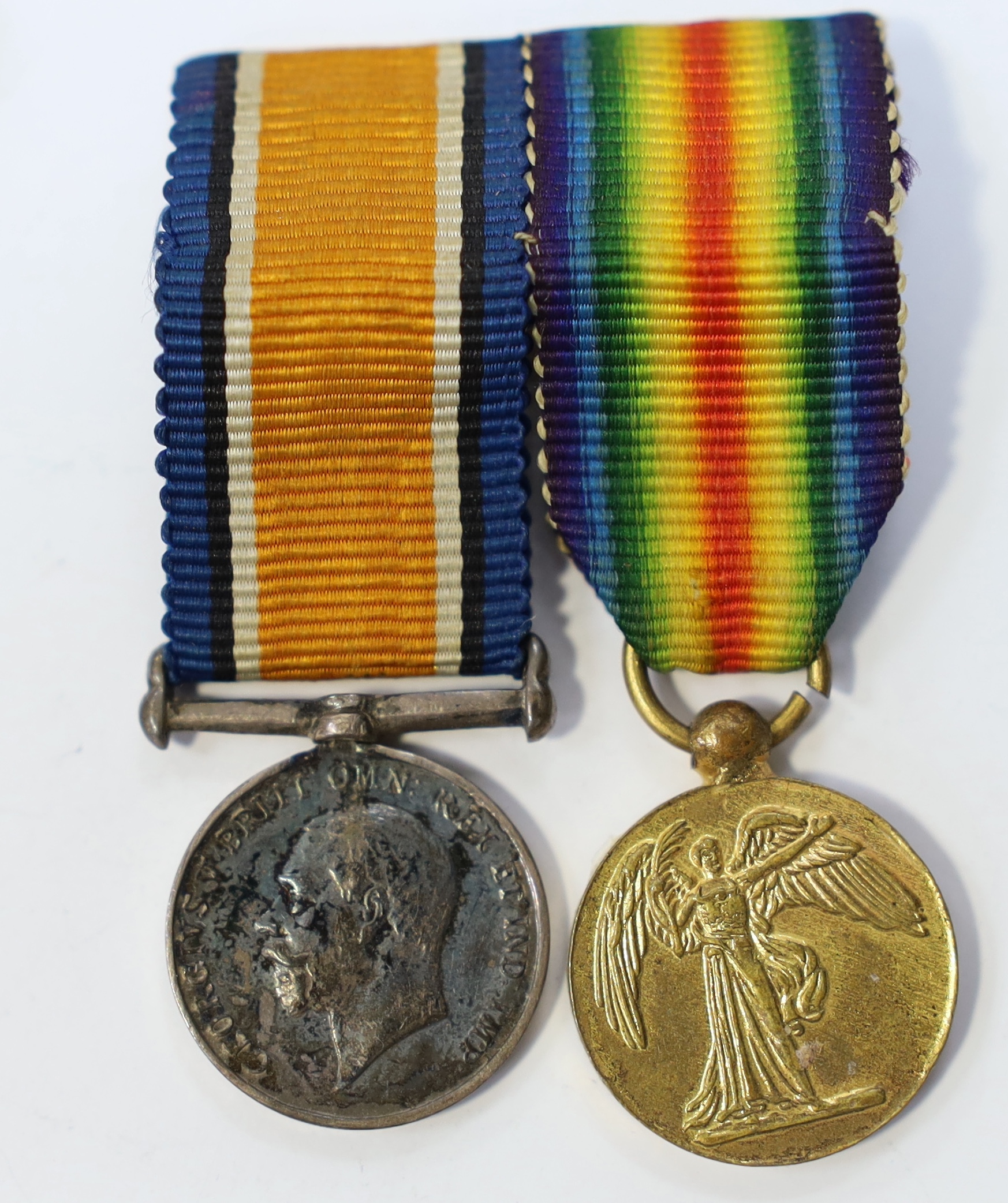 A WW1 pair oddly named for 'Maj Gen A.G.Dallas. Capt D.A.G.Dallas Jacob's Horse 1916-' with miniatures and a 1937 Coronation medal (5). Condition - fair